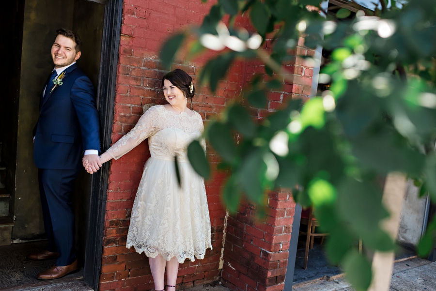 A couple share a First Touch before their wedding ceremony in Philadelphia.